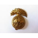 The Northumberland Fusiliers cap badge (Gilding-metal, slider) K&K: 593