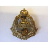 The East Lancashire Regiment WWII cap badge, KC (Bi-metal, slider) Maker J.R. Gaunt. K&K: 638