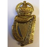 18th London Regiment (London Irish Rifles) Cap Badge. KC (White-Metal slider) maker J. R. Gaunt.