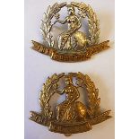 The Norfolk Regiment WWI Cap badges, two variants including an issue (Bi-metal, lugs) and economy (