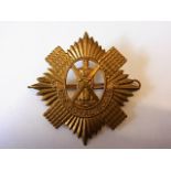 The Royal Scots (Lothian Regiment) WWI economy all brass pattern (Brass, lugs) K&K 589