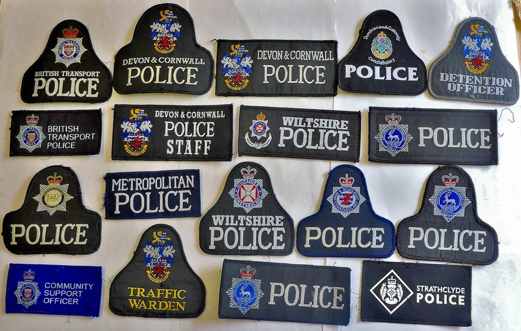 A collection of Police Shoulder and vest patches (18) including: BTP, Strathclyde, Devon & Cornwall,