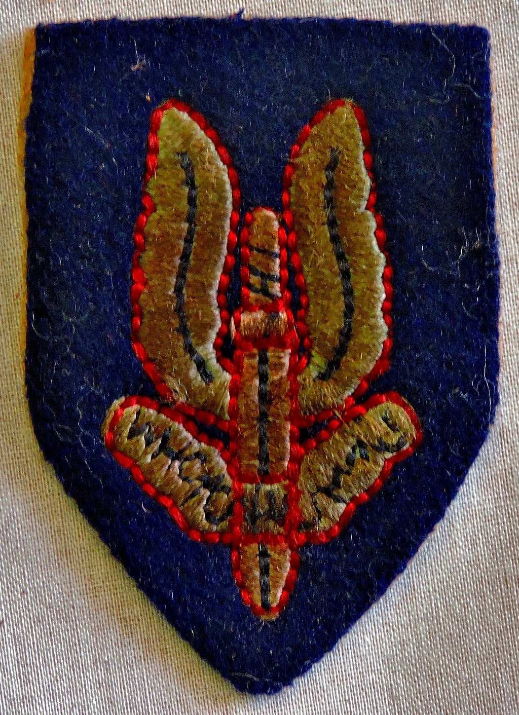 British WWII SAS Cloth Beret patch in fair condition. (Sold as is)