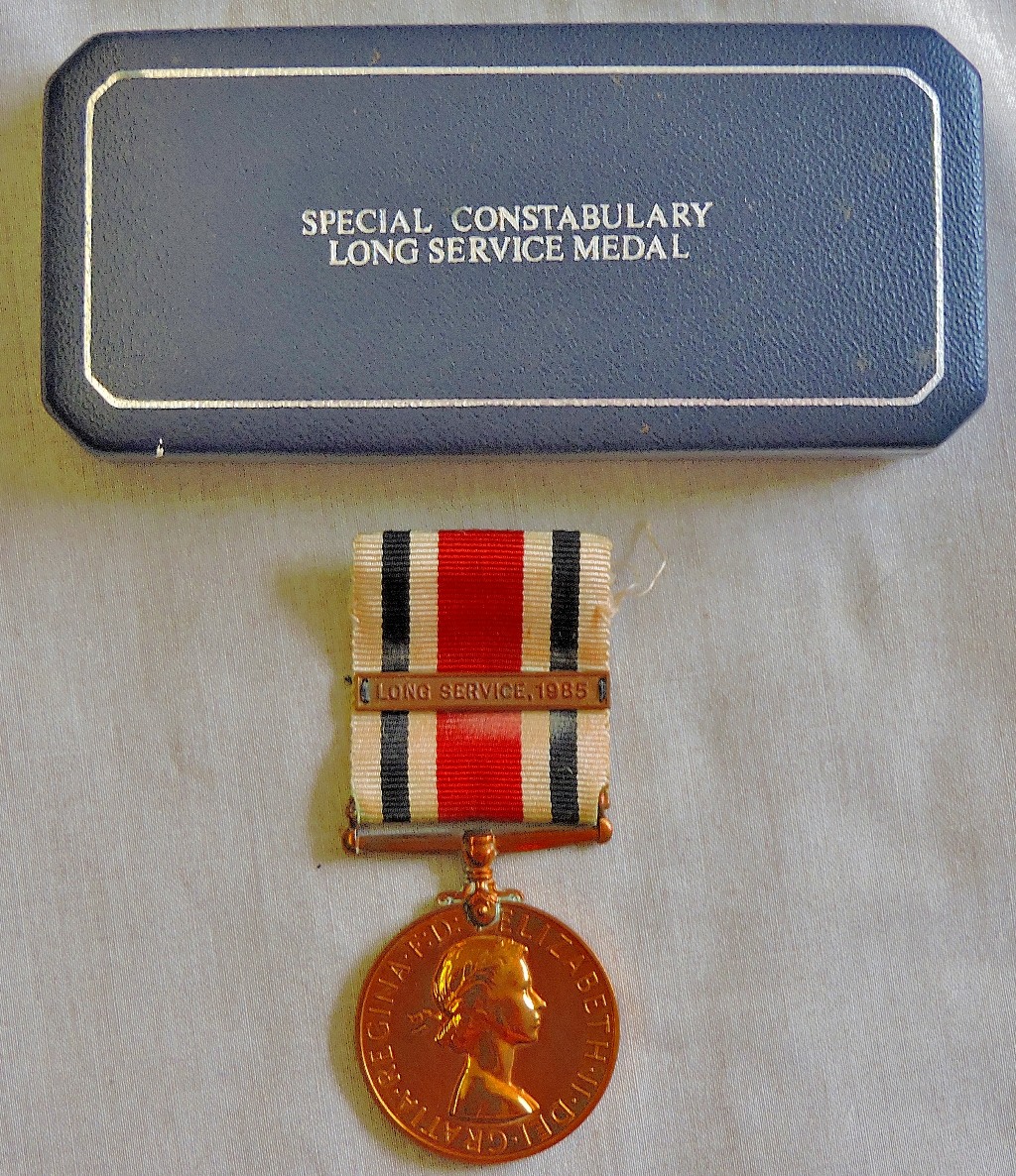 Special Constabulary Long Service Medal to Michael J.C. Wilson with Long Service, 1985 clasp. In