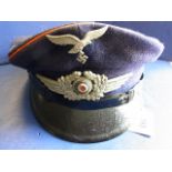 German Luftwaffe other ranks peaked cap, red/orange piped, strap possibly a later replacement, feint