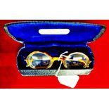 Vintage tortoiseshell round spectacles with gilt arms in original case. Good condition