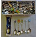 Spoons - Large tin of decorative tea spoons, approx 50.