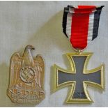 German WWII Iron Cross 2nd Class and an N.S.D.A.P. Reichs Party Day Nurnberg 1933 Rally badge. No