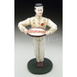 RARE COCA COLA BELLHOP DOORSTOP/DISPLAY STAND. American circa 1898. Fine cast iron example with 2