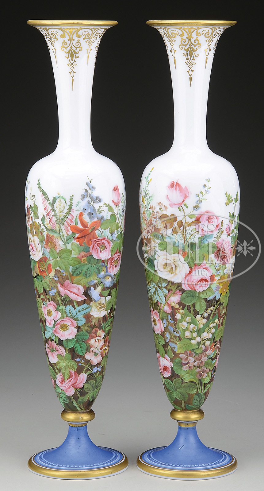 PAIR OF BRISTOL GLASS VASES. Late 19th Century. The matched pair in tall slender form with a