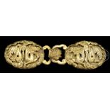 GILT BRONZE TWO-PIECE DRAGON BELT BUCKLE. 17th century, China. Of typical shape, both with central