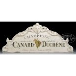 CARVED AND PAINTED CANARD-DUCHENE CHAMPAGNE SIGN. Victorian design carved sign having central