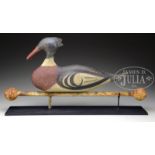 CAST IRON MERGANSER SHOP TRADE SIGN. Late 20th Century. Worn painted surface. Rests on a cast iron