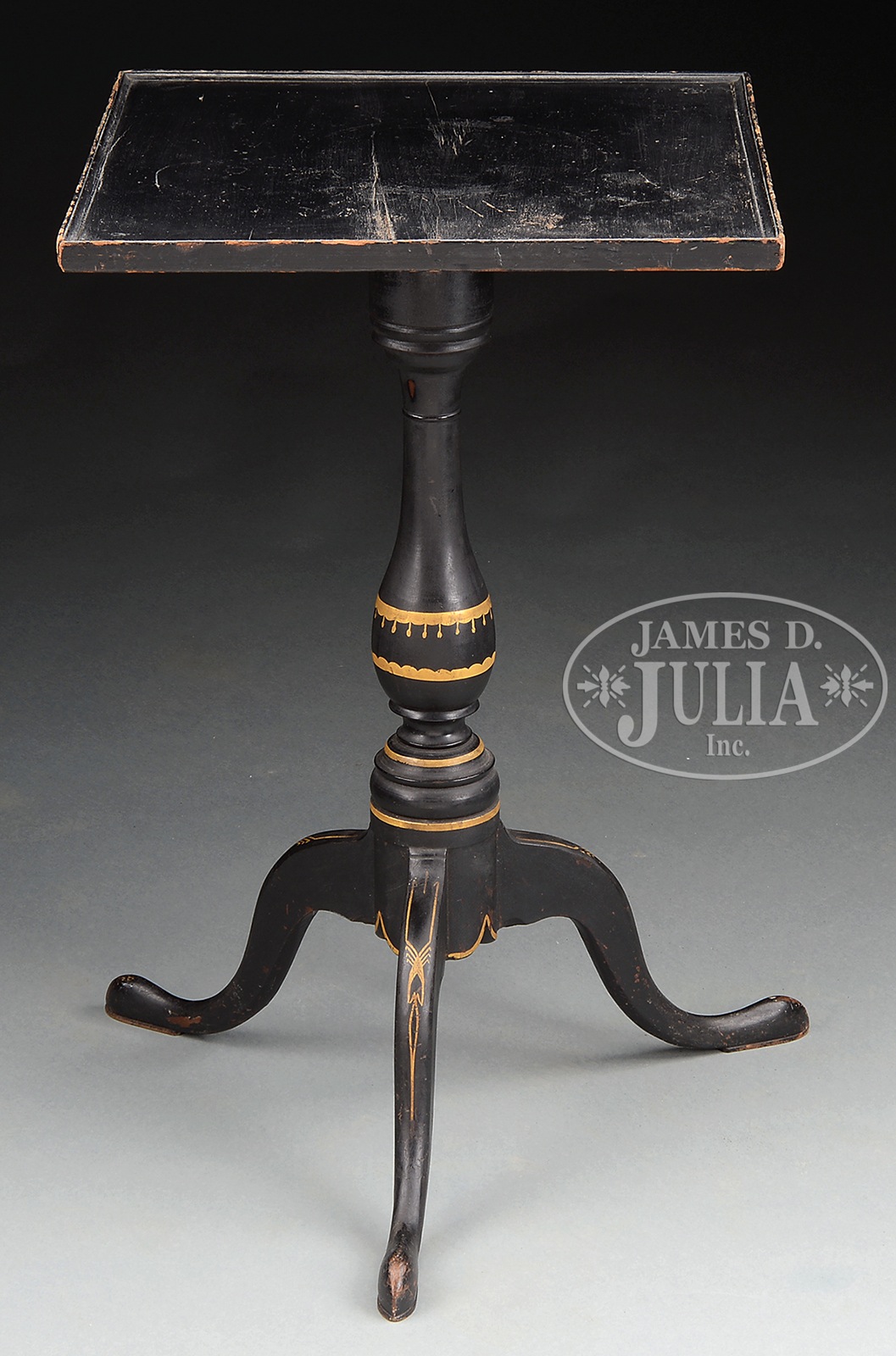 CHIPPENDALE TRAY TOP CANDLESTAND IN BLACK FINISH. Last quarter 18th Century, New England. The square