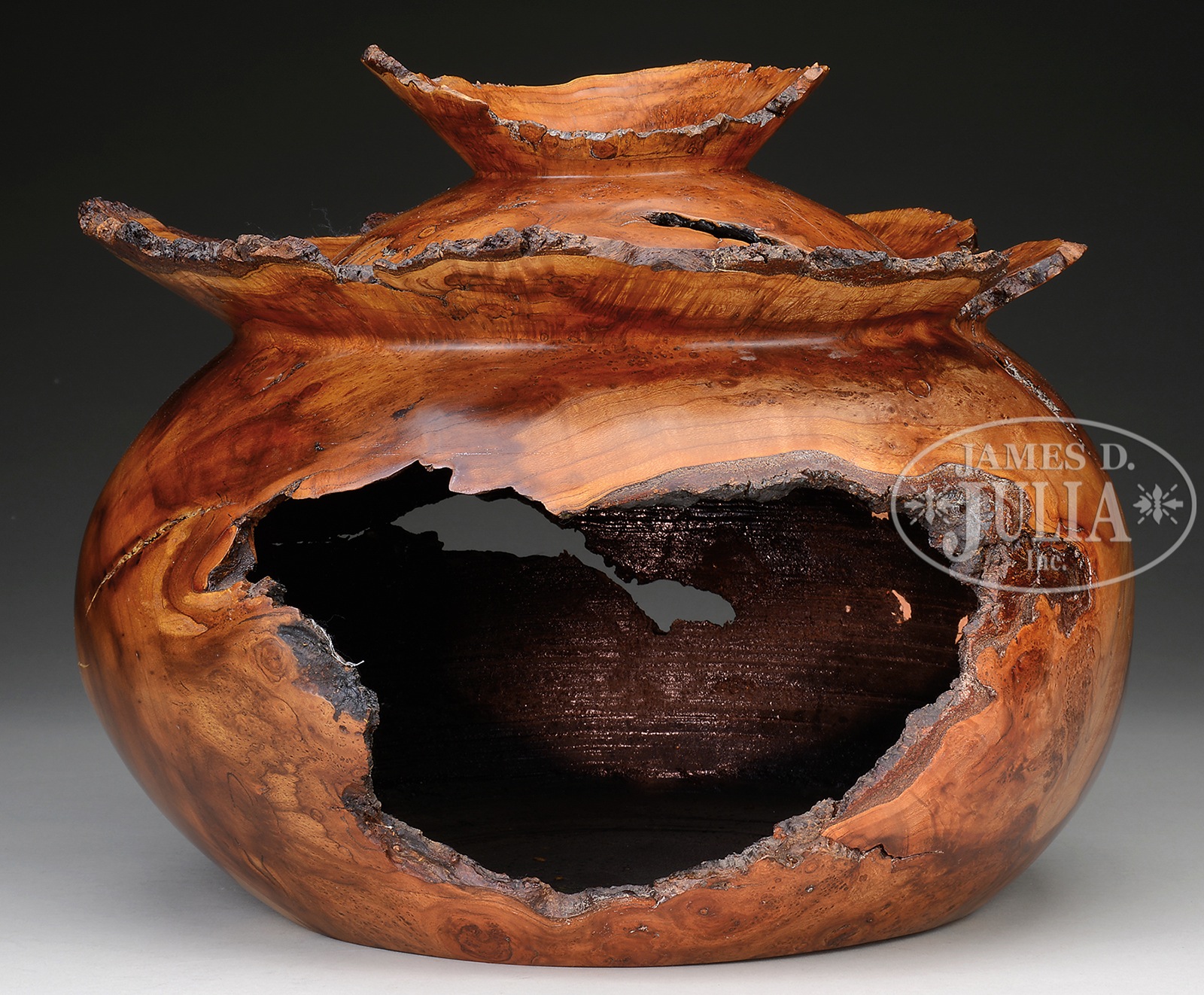 WONDERFUL CHERRY WOOD BURL CENTERPIECE. 20th/21st century. Burl carved from whole, having round