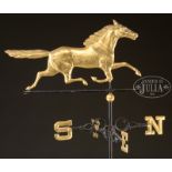 GOLD PAINTED ETHAN ALLEN RUNNING HORSE WEATHERVANE WITH DIRECTIONALS AND ROD. 20th century.