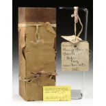 PATENT MODEL FOR A PAPER BAG. The remnants of the paper bag is tied around a wood box. The