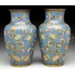 PAIR OF CLOISONNE VASES. China, 19th century. The vases decorated with a colorful display of various