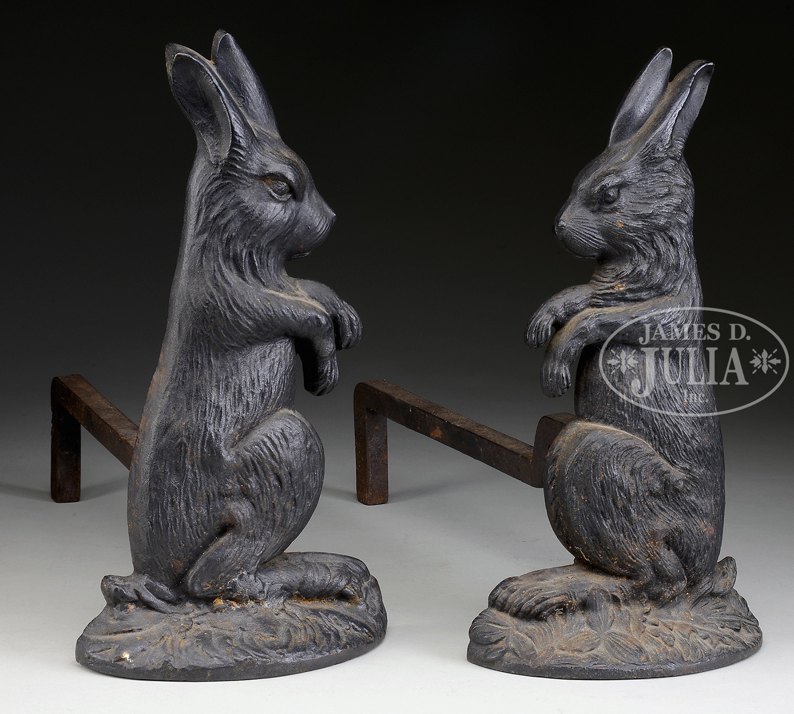 FABULOUS RARE PAIR OF SITTING RABBIT ANDIRONS. Cast-iron, circa first quarter 20th century, by