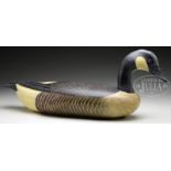 CARVED AND PAINTED CANADIAN GOOSE DECOY BY JOHN G. EGELI II. 20th century, New Jersey. Bearing the