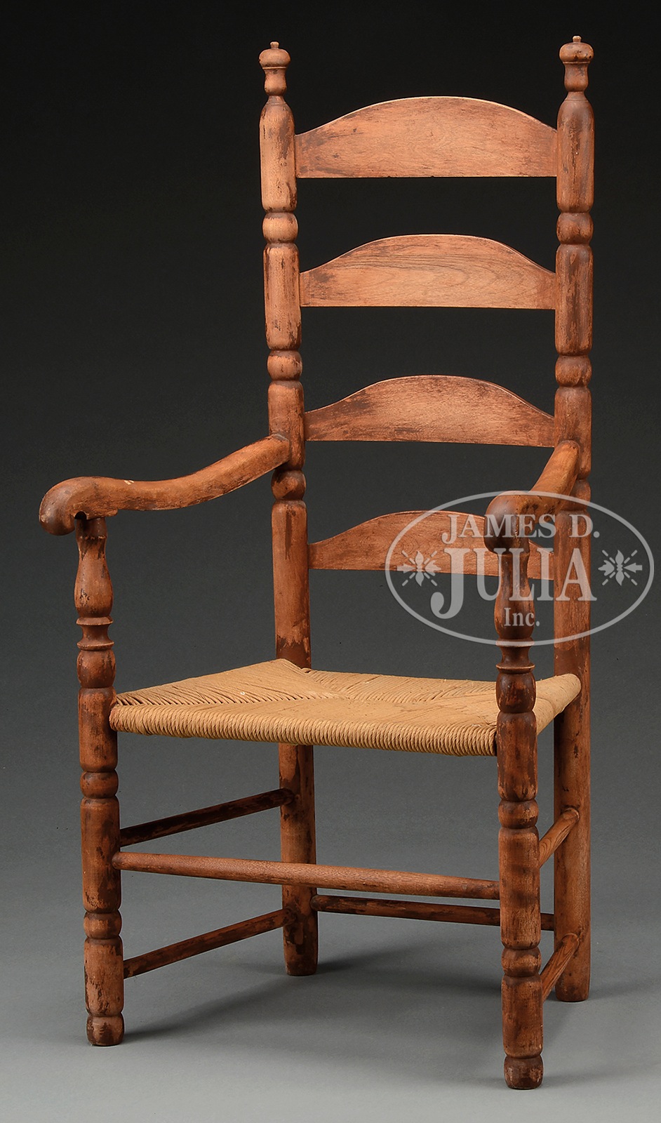 EARLY AMERICAN BIRCH LADDERBACK ARM CHAIR. First quarter 19th Century New England. Four arched slats