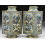 PAIR OF CLOISONNE VASES. China, 20th century. The pair made in Cong form, decorated with large