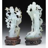 TWO CARVED JADEITE STATUES OF STANDING MAIDENS.