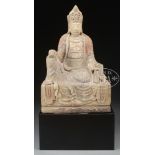 POLYCHROMED LIMESTONE SEATED FIGURE OF GUANYIN.