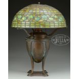 TIFFANY STUDIOS BRONZE TABLE LAMP WITH ACORN SHADE.