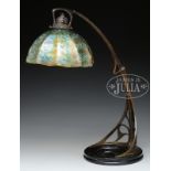 INTERESTING ART NOUVEAU STYLE BRONZE TABLE LAMP WITH ART GLASS SHADE.