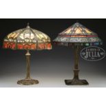 TWO UNSIGNED METAL OVERLAY SLAG GLASS TABLE LAMPS.