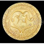 IMPORTANT SOLID 18K GOLD NEW YORK ZOOLOGICAL SOCIETY MEDALLION BY TIFFANY & COMPANY.