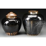 LOT OF FOUR GLAZED STORAGE JARS.