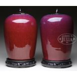 PAIR OF FLAMBE GLAZED PORCELAIN JARS.