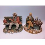 CAPO DI MONTE, 2 gilt based figure groups "The Clock Repairer" and "Tramp on a Bench" (slight