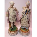 CONTINENTAL BISQUE FIGURES, pair of late 19th Century oval base bisque figures of courtier with