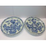 JAPANESE CERAMICS, Pair of underglaze blue fluted edge peony design 12" chargers (1 with edge chips)