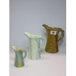 ROYAL WORCESTER BANANA LEAF WARE, 3 graduated leaf jugs, variations in colouring