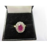 RUBY & DIAMOND RING, 18ct gold ruby and diamond cluster ring,