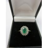 DIAMOND & EMERALD RING, 18ct gold diamond and emerald cluster ring,