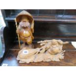 ORIENTAL CARVING, mythological group of merchant with bag of grain, 14" length,