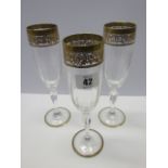 GLASSWARE, set of 12 gilded rimmed champagne flutes,