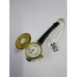 WRIST WATCH, 14ct gold cased half hunter wrist watch, with white enameled dial,