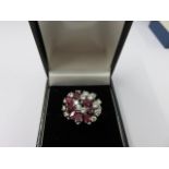 RUBY & DIAMOND RING, 18ct white gold diamond and ruby cluster ring,