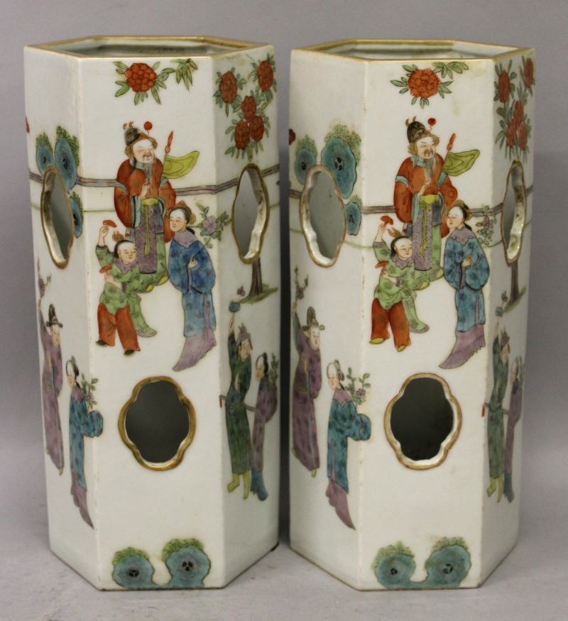 A PAIR OF CHINESE FAMILLE ROSE PORCELAIN HAT VASES, of hexagonal section, each decorated to the