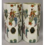 A PAIR OF CHINESE FAMILLE ROSE PORCELAIN HAT VASES, of hexagonal section, each decorated to the