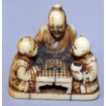 A GOOD QUALITY SIGNED JAPANESE MEIJI PERIOD IVORY NETSUKE, well carved in the form of a man