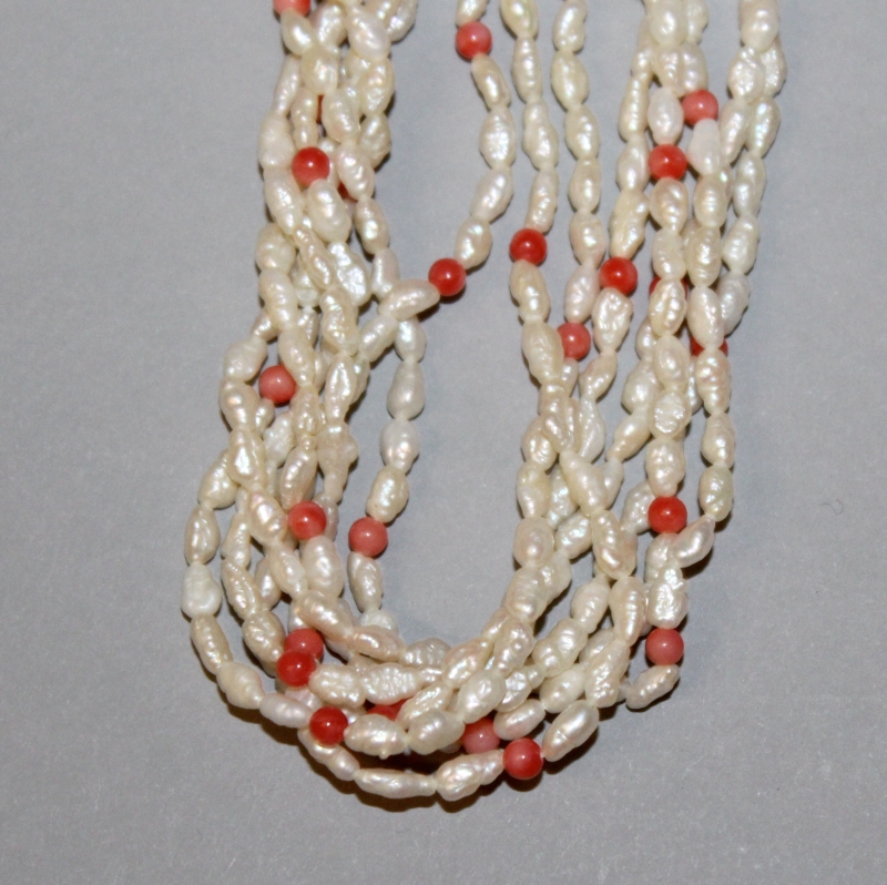 A GROUP OF FIVE BEAD NECKLACES, composed of various materials, and an ivory pendant and a brooch. ( - Image 3 of 7