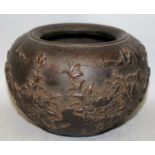 A HEAVY CHINESE BRONZE BOWL OR CENSER, weighing 3.39Kg, the sides cast in high relief with a