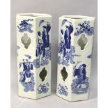 A PAIR OF CHINESE BLUE & WHITE PORCELAIN HAT STANDS, each decorated with the Eight Immortals, each